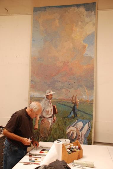 John Collier working on the painting in his studio